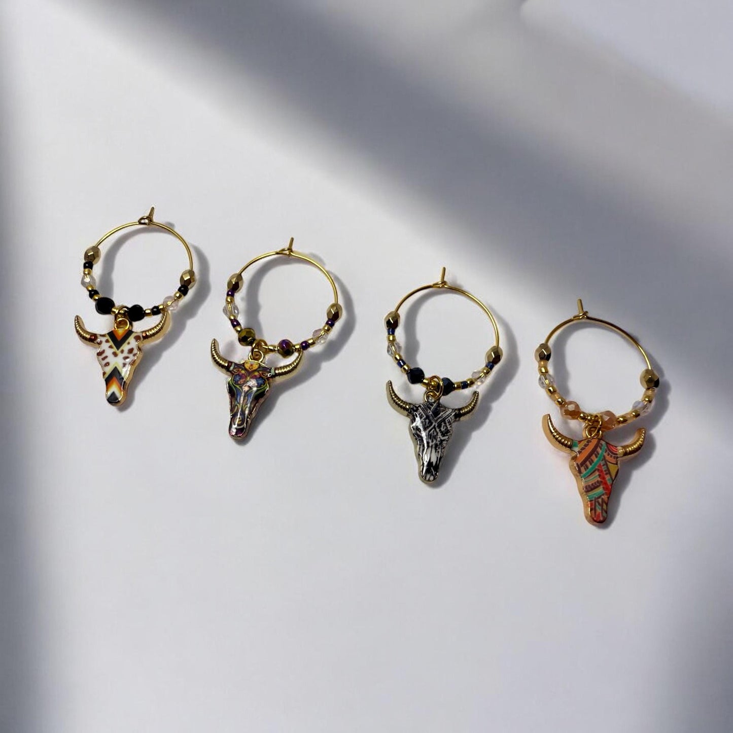 Western Themed Steer Wine Charms with tribal markings and crystal beading embelishments