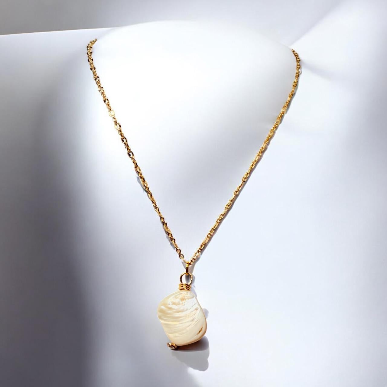 Stunning White Oyster Shell Pendant set on oval gold faceted pendant, 18 inches