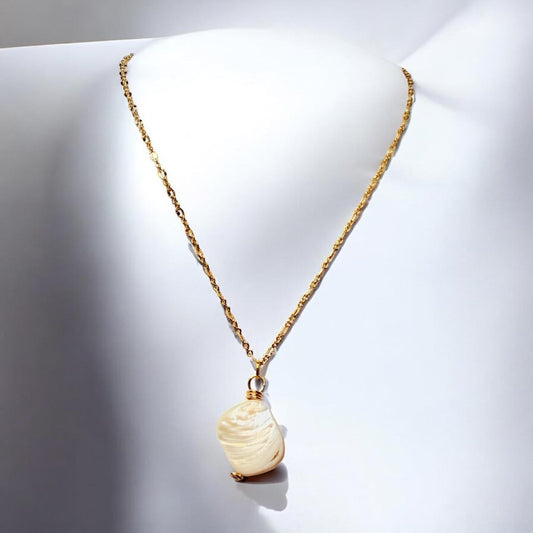 Stunning White Oyster Shell Pendant set on oval gold faceted pendant, 18 inches